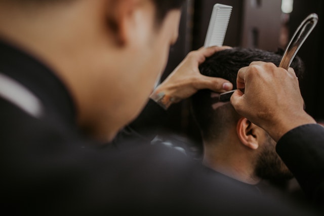 A Barber Giving a Haircut